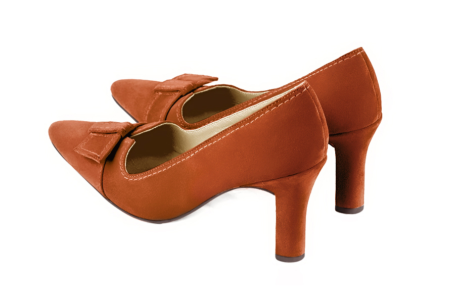 French elegance and refinement for these terracotta orange dress pumps, with a knot on the front, 
                available in many subtle leather and colour combinations. Possibility to customize with your colors and materials.
With its original cutout, this pretty fitted pump
will render you great services, combining comfort and distinction. 
                Matching clutches for parties, ceremonies and weddings.   
                You can customize these shoes to perfectly match your tastes or needs, and have a unique model.  
                Choice of leathers, colours, knots and heels. 
                Wide range of materials and shades carefully chosen.  
                Rich collection of flat, low, mid and high heels.  
                Small and large shoe sizes - Florence KOOIJMAN